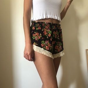 Black Floral Pattern Flowy Fringe Shorts